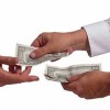 The True Cost of a Metal Roof for Miami Homeowners Cash changing hands