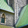 Going Green: All About Copper Patina Aged copper roof on church